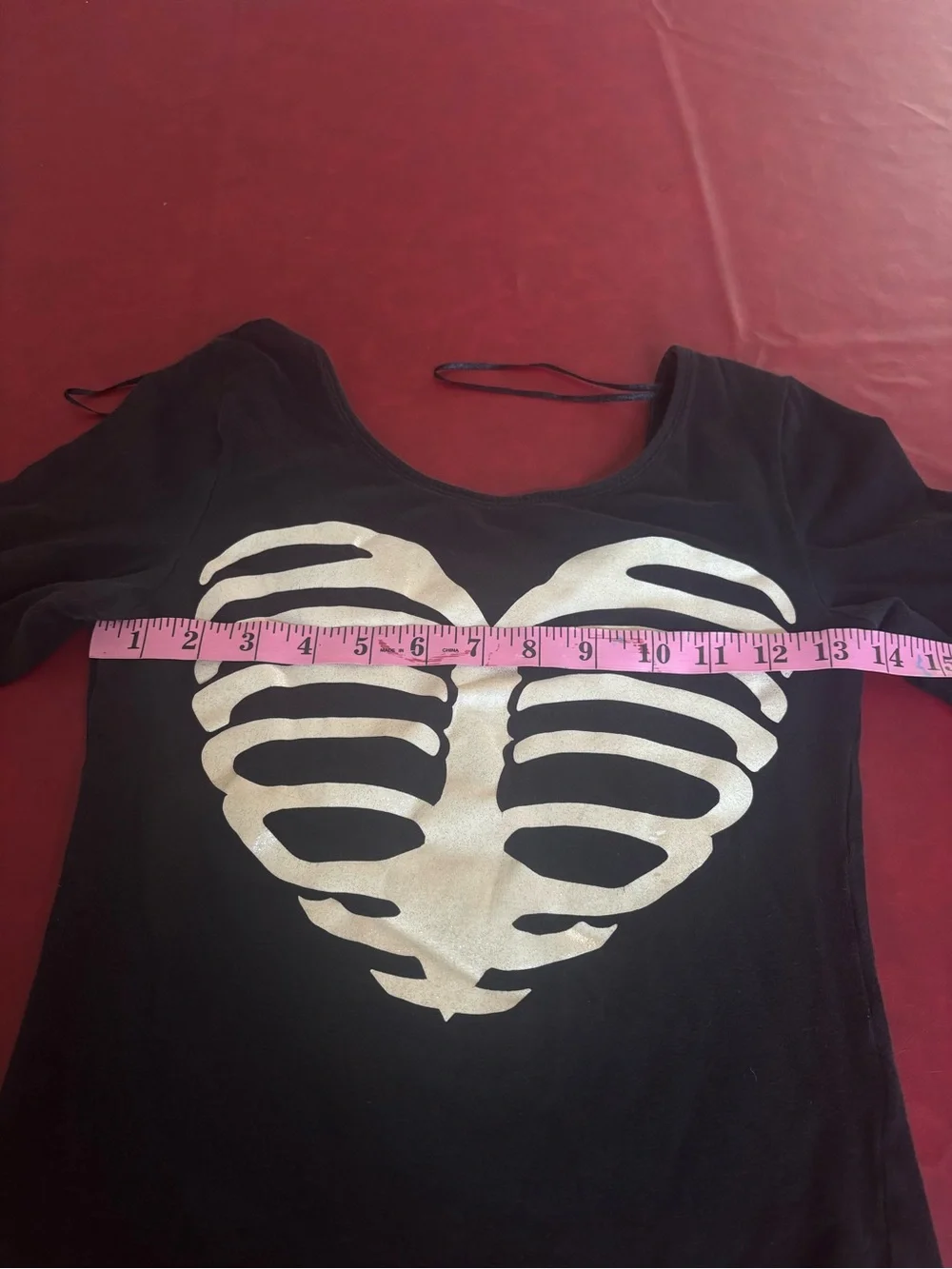 Black Long-Sleeve Top with White Ribcage Heart Graphic